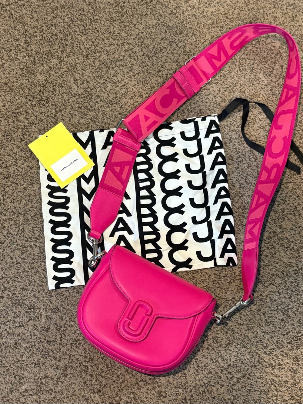 Marc Jacobs Bright Pink Mini Saddle Bag with Logo Strap tough to find.
